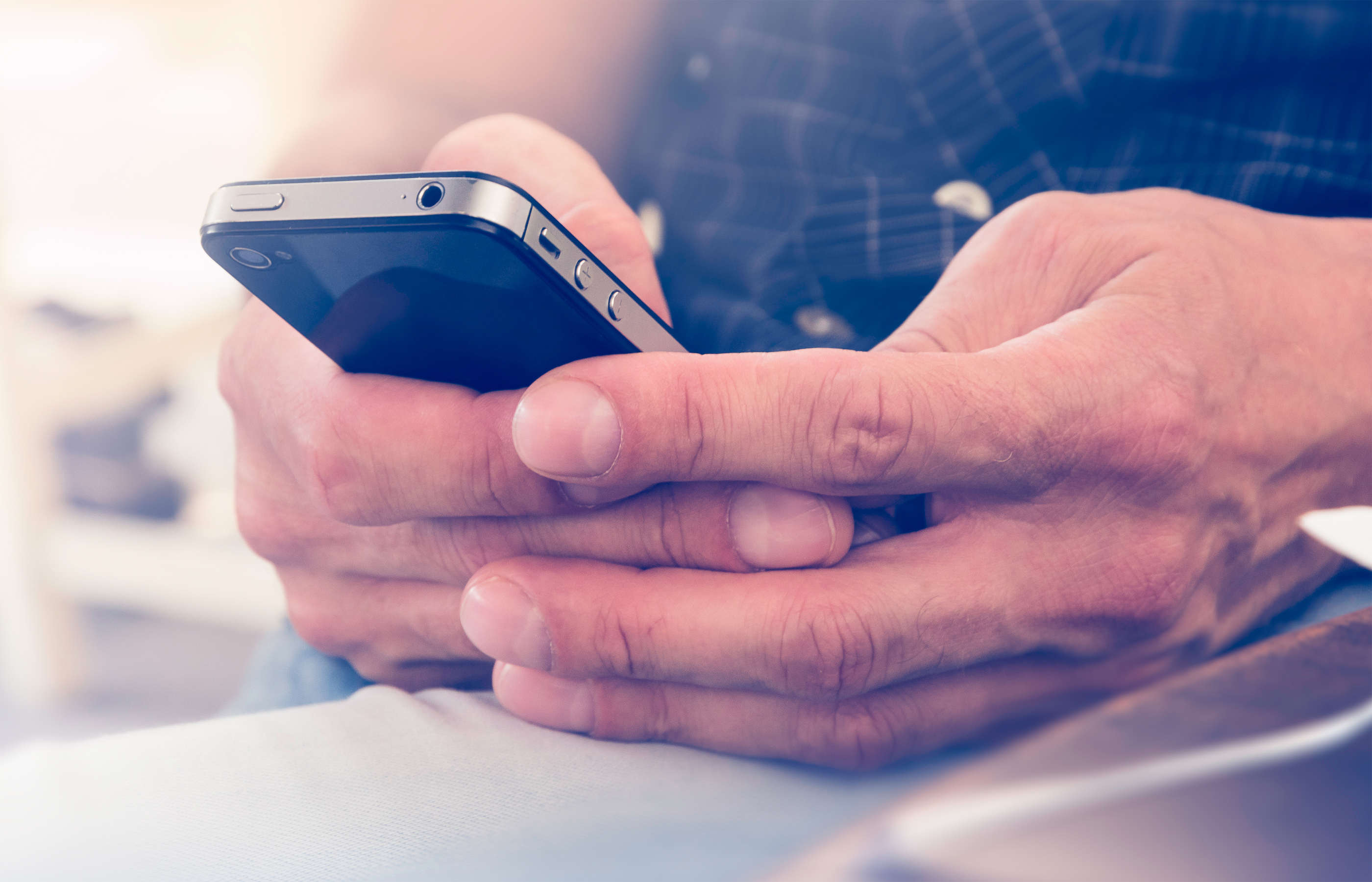 Our phone. Mobile on the hand. Holding Phone close. It hands with Phone. Phone typing hand.