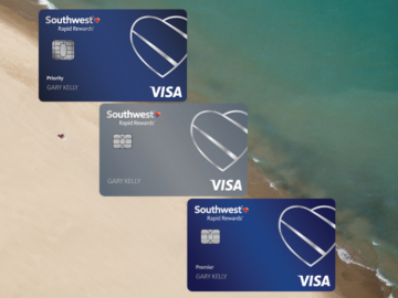 a group of credit cards on a beach
