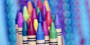 a group of crayons in a box